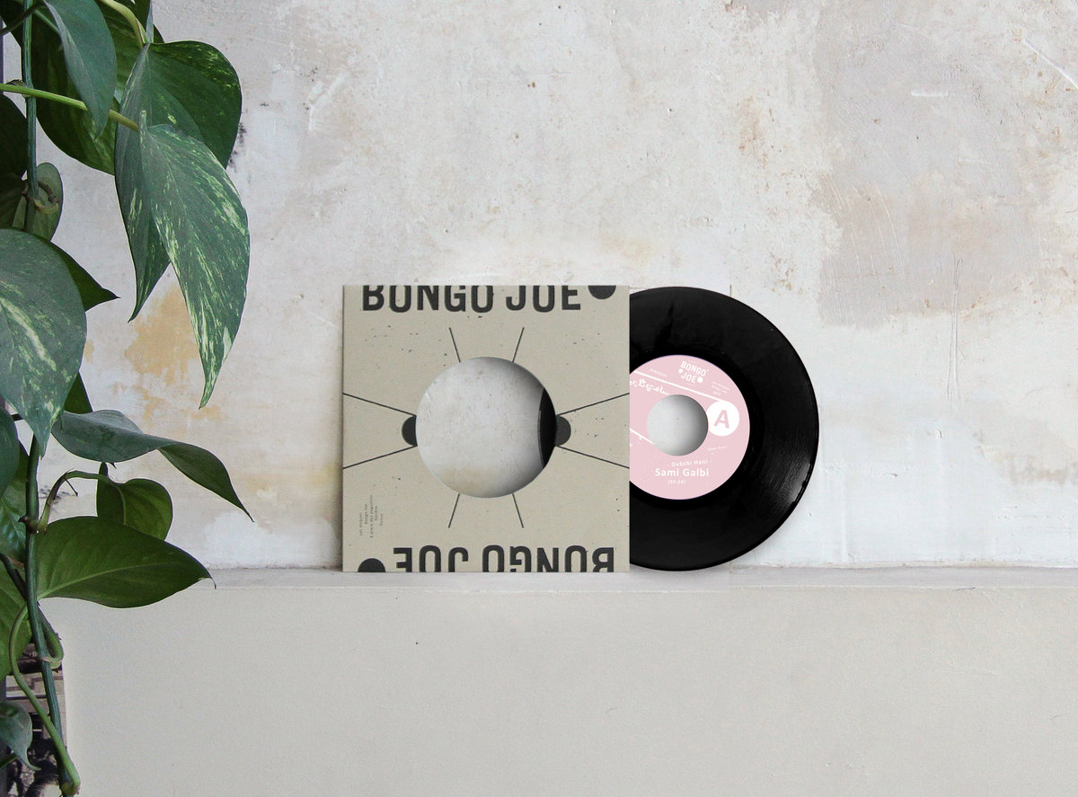 Swiss-Moroccan musician from the alternative scenes in the French-speaking part of Switzerland, Sami Galbi draws from the music of his childhood, the one he rediscovered in the cabarets of Casablanca — raï and chaâbi that he narrates in his own way. Using analog machines, raw synthesizers, and guitar effects, he enjoys modulating North African popular and folkloric music, giving them a pop texture and a club atmosphere. On stage, Sami advocates for a 'high energy' music, borrowing from the codes of urban genres such as English bass music and West Coast hip-hop. First single, "Dakchi Hani," which translates to "It's not serious" in Moroccan Darija, is a post-breakup love song, a sort of reconciliation with the past, a celebration of a encounter that lingers nonetheless. It's a way of starting over by retracing one's own emotions with humor. The track draws inspiration from raï and, more broadly, from North African popular and folkloric music, incorporating a contemporary rhythmic and sonic foundation. The title keeps the listener engaged until the end. The prominent melodies of the guitars, raw synths, and straightforward vocals are anchored on a compact and bouncing rhythmic base borrowed from lo-fi electronic cultures. Rruina and its secret will be revealed soon.