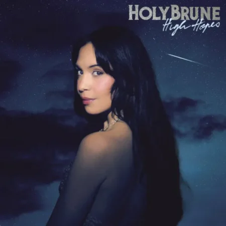 Auteure, compositrice et interprète, HolyBrune séduit par sa voix douce aux influences R&B et ses toplines accrocheuses, portées par des productions imprégnées de Funk et de Soul. Révélée avec Dabeull sur le titre "DX7", salué par DJ Snake, elle a également signé le hit "You & I", certifié disque d'or avec plus de 50 millions de streams. Elle a enflammé les scènes de Londres à Los Angeles en passant par New-York, aux côtés du Dabeull Live Band, affirmant ainsi son identité glamour et internationale. Après ces nombreux coups d'éclats internationaux, elle dévoile son premier album "High Hopes" : dans la continuité de ses hits précédents aux cotés de Dabeull, elle livre 13 titres addictifs à l'énergie groovy. A la fois sensuelle et puissante, sa musique aux synthés vibrants et aux basses funky est irrésistible. Avec “High Hopes”, elle affirme une liberté nouvelle et signe un projet lumineux où désir, féminité et émotion s'entrelacent avec audace. Un album fort et saisissant, à l'ambiance électrisante autant intemporelle qu'universelle.