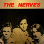 The Nerves étaient un trio américain de power pop, formé à San Francisco en 1974 puis basé à Los Angeles, composé du guitariste Jack Lee, du bassiste Peter Case et du batteur Paul Collins. Les trois membres composaient et chantaient. Bien que le groupe n'ait eu qu'une existence éphémère, il a réussi à autoproduire en 1976 un EP légendaire de quatre titres — distribué par Bomp! Records — comprenant deux chansons de Jack Lee (« Hanging On The Telephone » et « Give Me Some Time »), une de Peter Case (« When You Find Out ») et une de Paul Collins (« Working Too Hard »). Ils ont également donné de nombreux concerts le long de la côte Ouest et effectué des tournées aux États-Unis et au Canada, assurant notamment la première partie des Ramones. The Nerves sont devenus l'un des groupes les plus influents de la nouvelle vague power pop apparue à la fin des années 70, un genre qui continue de susciter des vocations aujourd'hui auprès de jeunes formations comme The Lemon Twigs, Sharp Pins et Mod Lang. Ah oui, n'oublions pas cette petite reprise de « Hanging On The Telephone » qui a fait sensation (et continue de le faire) après que Jeffery Lee Pierce — président de l'antenne côte Ouest du fan-club de Blondie et futur leader du Gun Club — a remis une copie sur cassette de l'EP à Debbie et Chris en 1978.